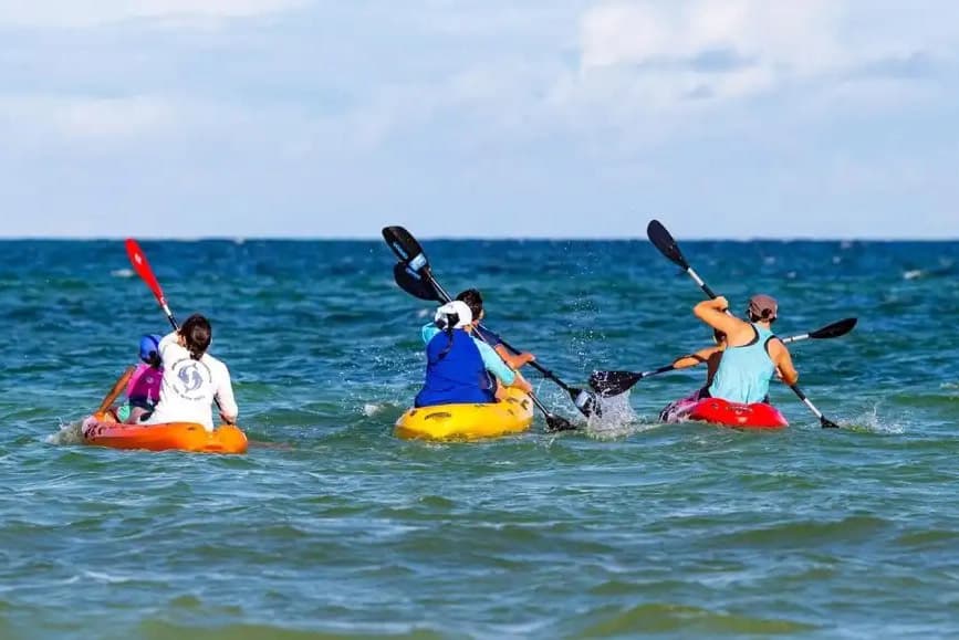 People kayaking in the ocean