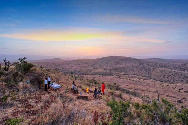 Tourists enjoying sundowners