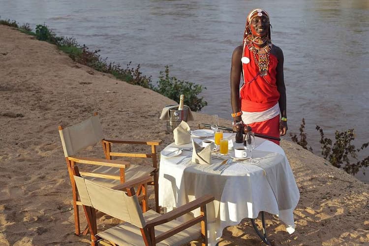 Champagne by the riverside at Ashnil Samburu Camp, Samburu National Reserve