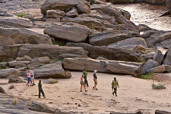 Tourists on a nature walk, at Tsavo